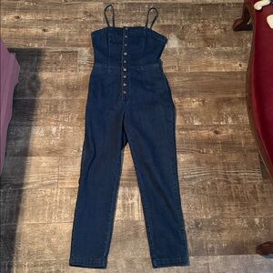 Excellent condition. Free People Indigo Denim Jumpsuit size 4. Open back
